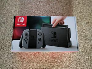 Quick sale - new Nintendo Switch with grey Joy-con
