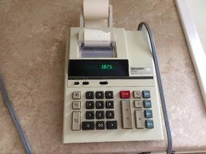 Sharpe Calculator with paper roll