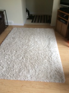 Used white shag rug