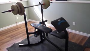Weight bench with attachments & free weights