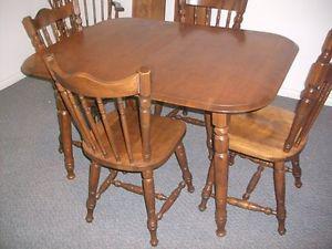 hardwood table and 4 chairs!!great shape