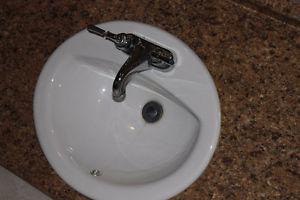 Bathroom sink faucet and counter top (with sink cut out)
