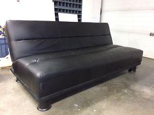 Black leather couch/futon.