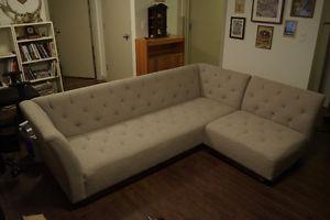 Elegant grey couch and add-on seat