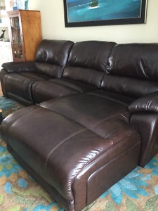 Exc cond, leather sofa w electric recliner & reclining