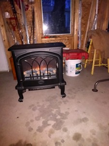 Heated metal fireplace for sale.