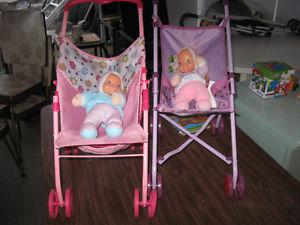 Two strollers with dolls