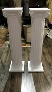 2 white plastic columns Pedestals (almost new)
