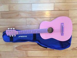 Child size pink guitar
