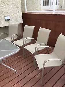 FOUR PATIO CHAIRS