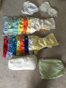 16 Fuzzibuns diapers with inserts, additional liners, diaper