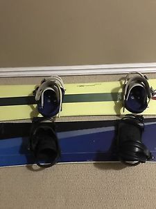 2 snowboards with bidings