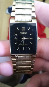 Armitron gold watch