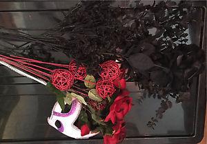 Black and red silk flowers