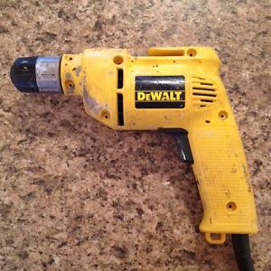 DeWALT D V Drill in good used condition.