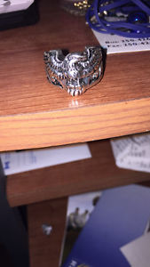 Eagle stainless Steele ring says size 10 fits like a 11
