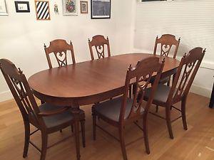Solid wood dining room table with 6 chairs