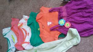 baby body suits and sleeper almost new