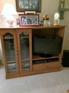 maple entertainment unit and TV