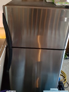 Stainless Steel Fridge and Flat Top Stove