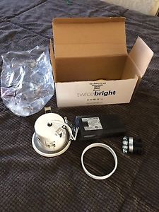 Twicebright sealed can downlight