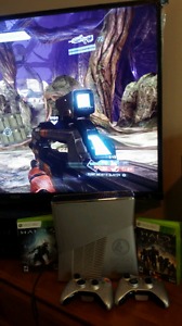Xbox 360 mint condition with 2 controller and 10 games