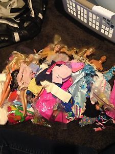 Barbies and Barbie accessories galore