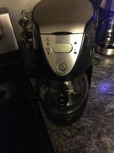 GE black and silver coffee maker