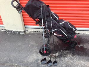 Nike golf bag, cart and clubs
