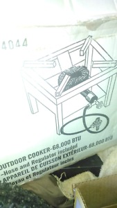 Outdoor cooker, brand new.ever used $40 obo