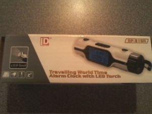 Travelling World Time Alarm Clock w flashlight - $10