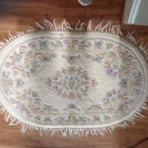 4 oval wool rugs