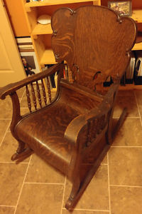 Antique solid oak rocking chair