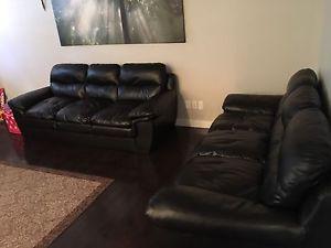 Beautiful leather couches two years old not used much