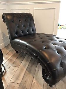 Brown tufted chaise with nail heads