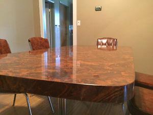 Dining table with 6 chairs of leathery cover