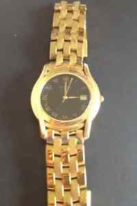 Gucci M man gold-plated watch