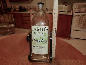 Lambs rum bottle in cradle #.