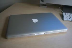 MacBook with new battery and charger