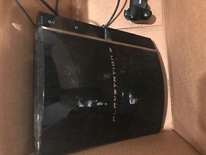 Playstation 3 in good condition with 9 games.
