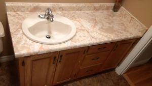 Sink, faucet, bathroom vanity cabinet and countertop