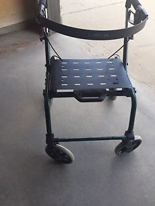 Walker - foldable - four wheels and seat. VG Condition