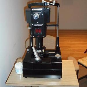 American Optical non-contact tonometer with adjustable table