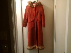 Beautiful vintage Irving Posluns suede coat with fur trim.