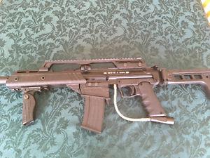 Bt slice paintball marker with g36 kit on it