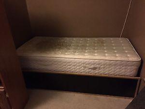 Captains bed with storage and mattress.
