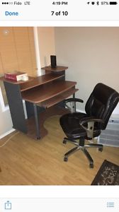 Computer chair and office table for sale in timberlea now.