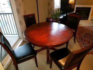 Dining set (dining table and 4 leather look chairs)