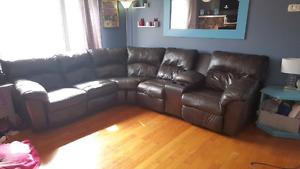 Large reclining brown leather sectional