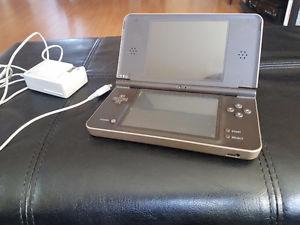 Nintendo DSi XL with charger